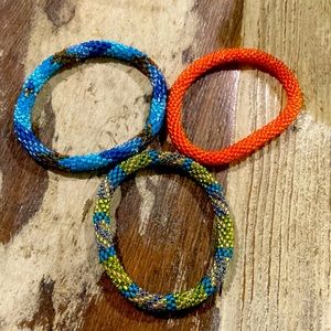 3 BEADED BRACELETS 1 ORANGE 1 BLUE VARIETY & BROWN 1 GREEN/TEAL & BLUE